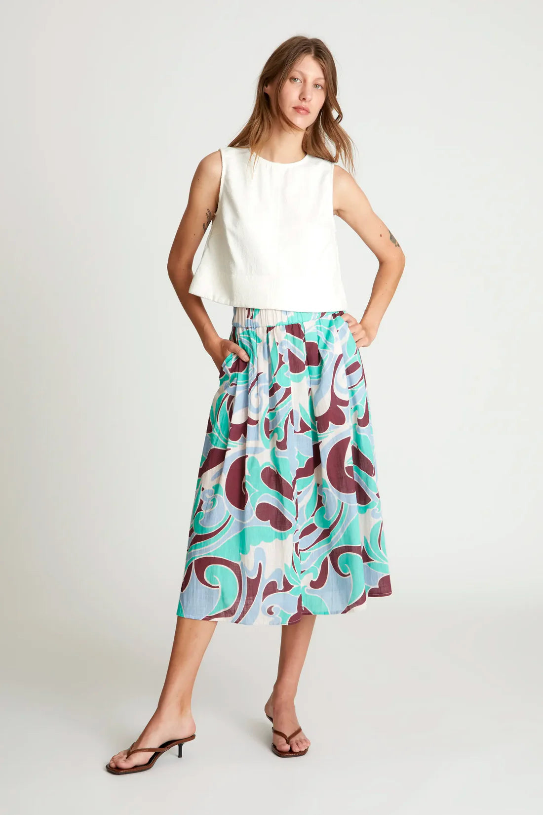 Falda midi – estampado turquesa y marrón