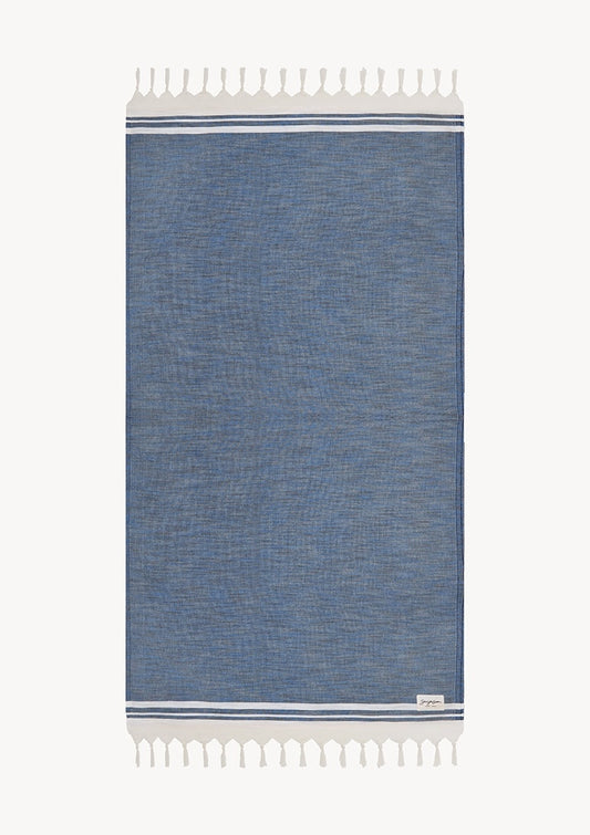 Toalla de playa – azul liso con flecos
