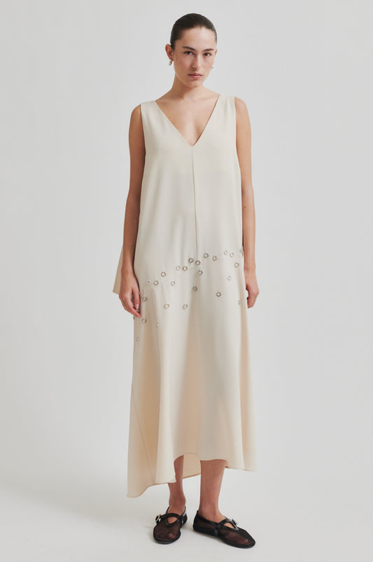 Vestido asimetrico con arandelas
